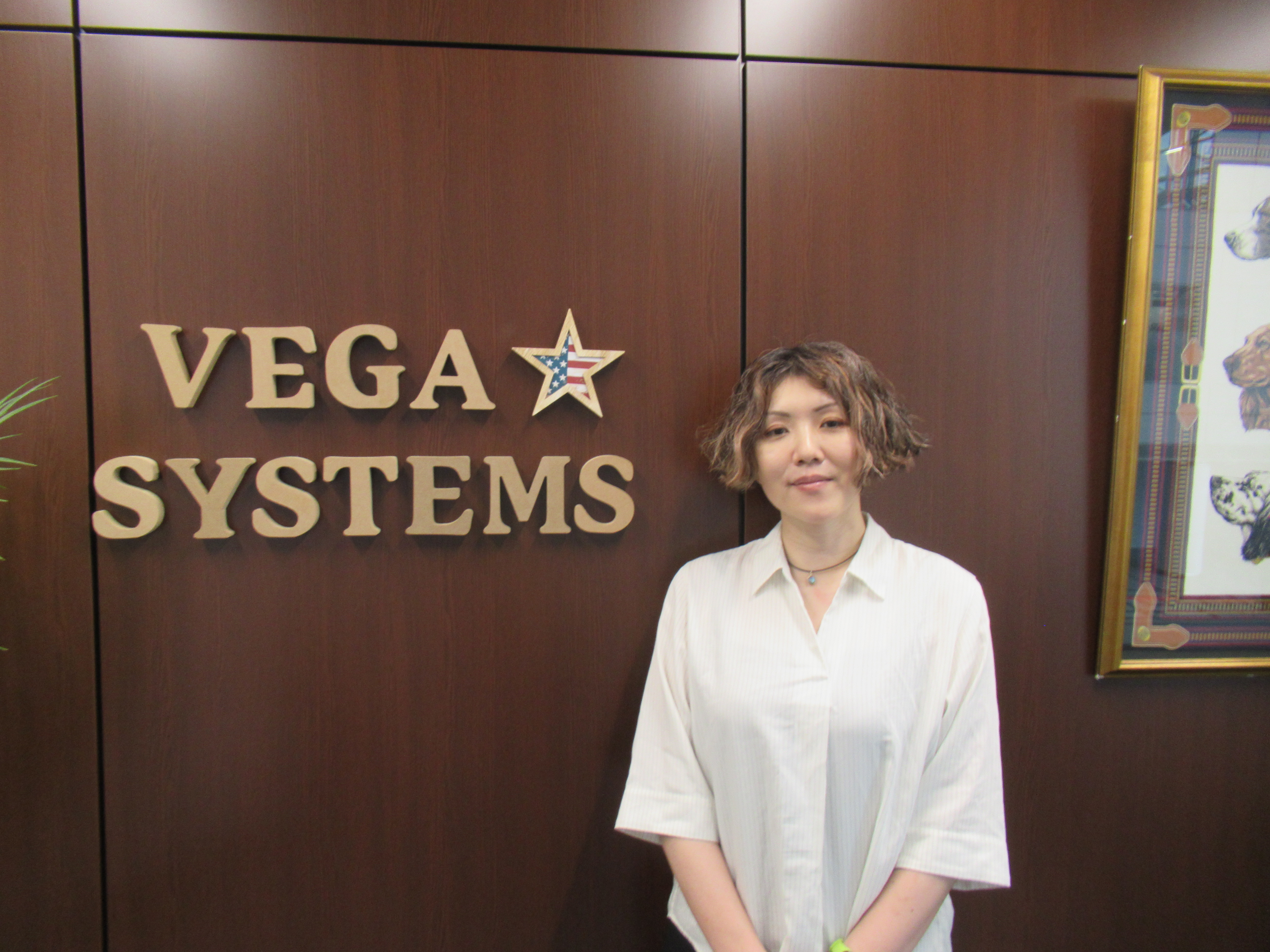 IT事業部門 企画開発三部　マネージャー　鶴田　様