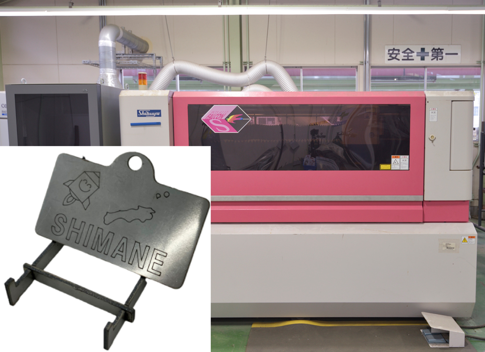 写真：炭酸ガスレーザー加工機の設備